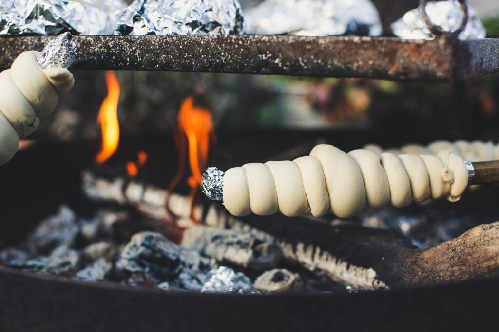 Grilling Stick Bread on Metal Skewers
